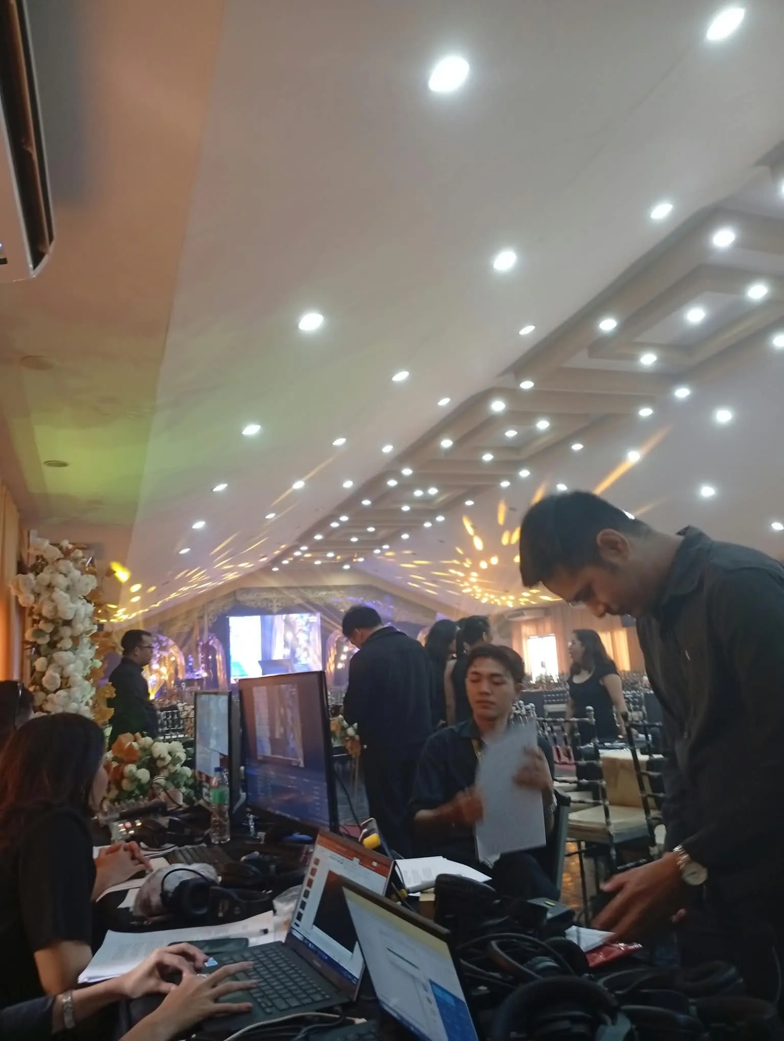 The ballroom seen past the production tables during the program.