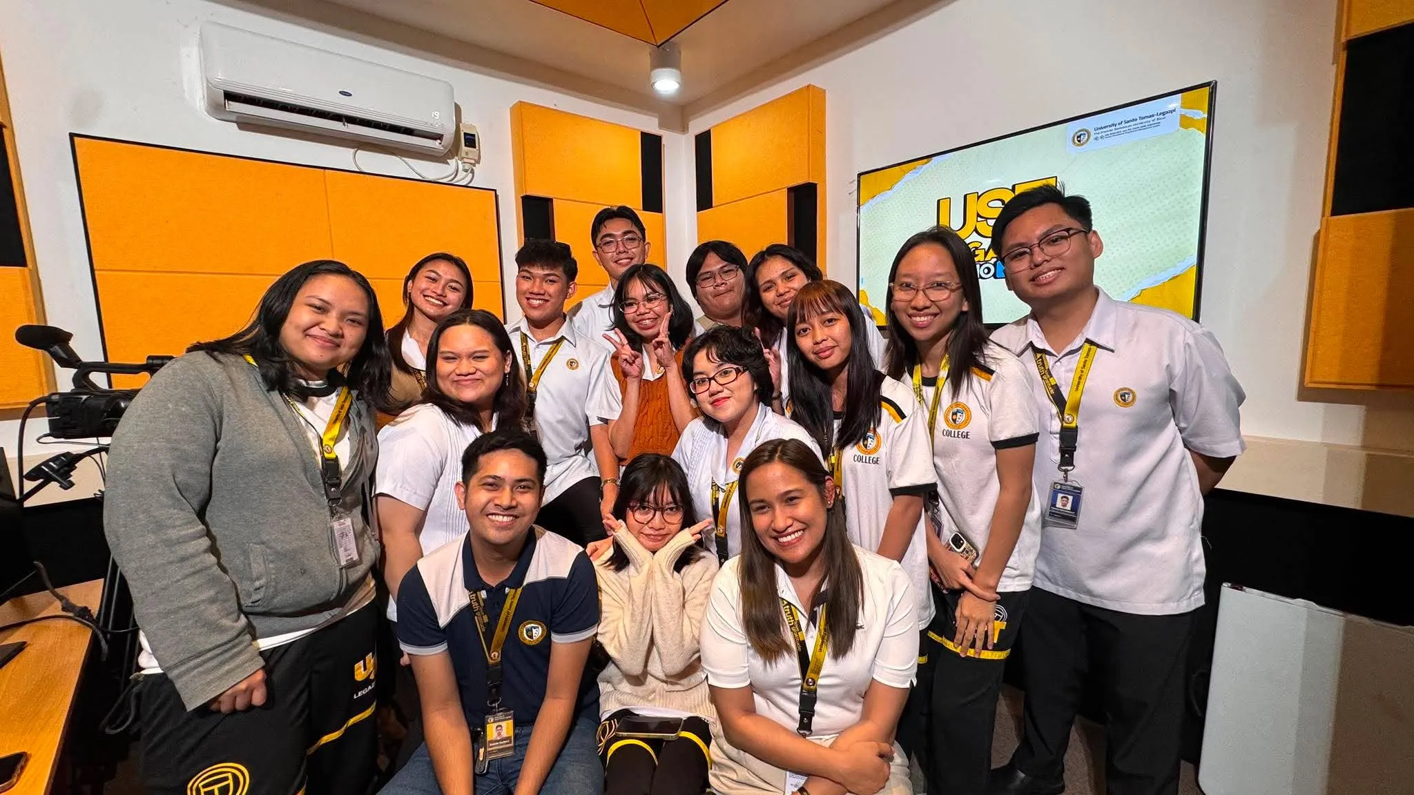 The Radyo Tomasino crew posing together in the studio.