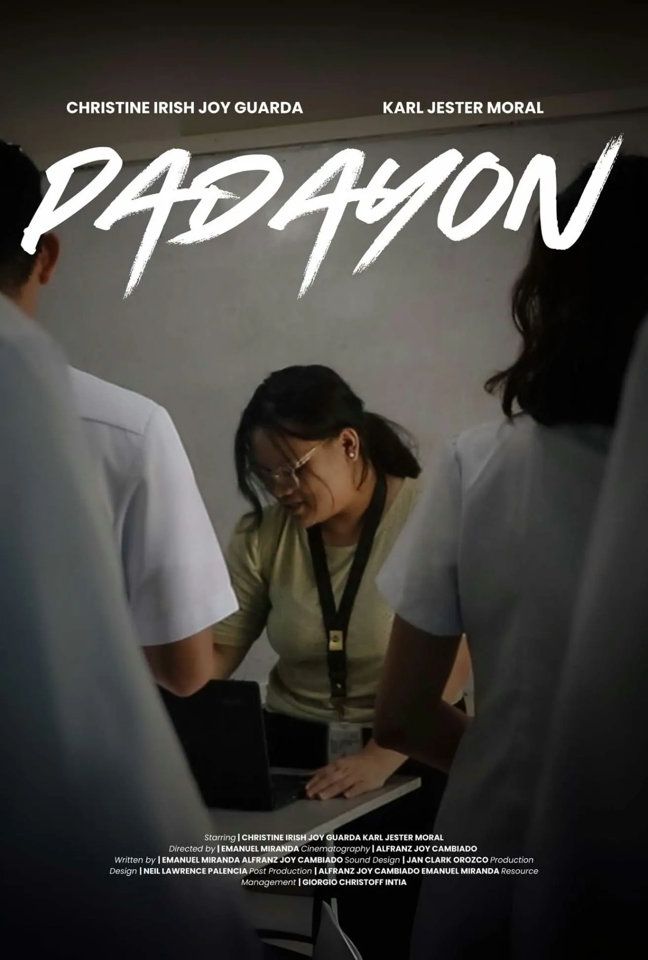The poster for Padayon, a student working at a desk among classmates, starring Christine Irish Joy Guarda and Karl Jester Moral.